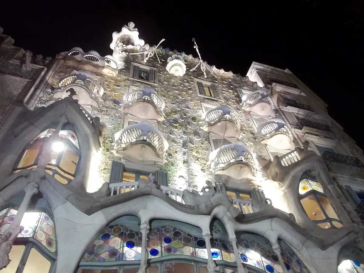 The facade of Casa Batlló lit up